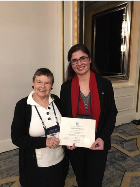 Palwasha Marwat and her mentor Dr. Carolyn Shields, presenting the 2019 - 2021 Jackson Scholar certificate